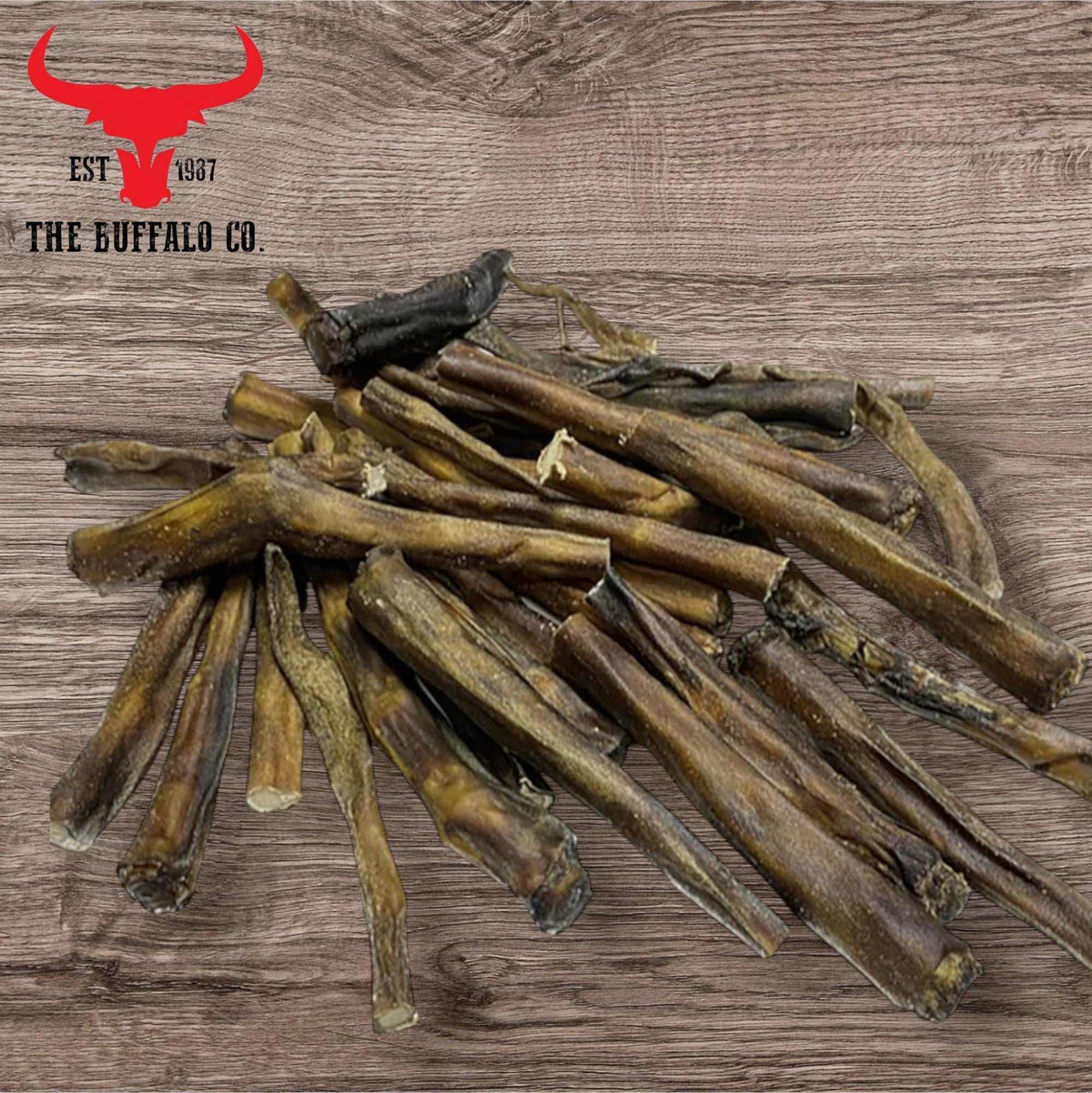 Buffalo Tail - Dog Treats in natural dark brown shades, with long, dried, irregularly shaped chewy pieces