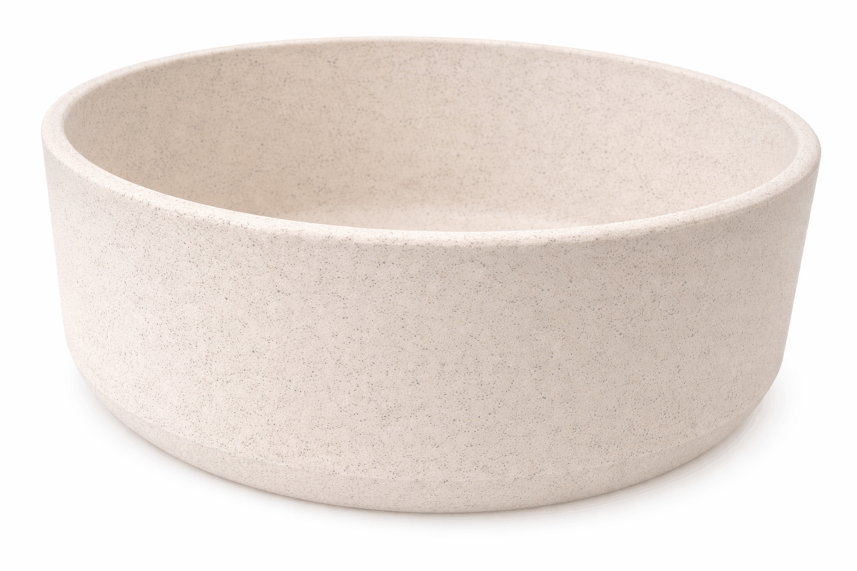 Bambū Bamboo Dog Bowl in pale taupe with a solid, subtly speckled finish and a broad, rounded shape