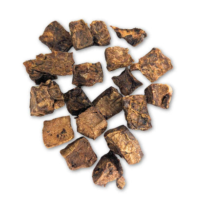 Buffalo Bites dog treats made from natural buffalo lung, with irregular chunky pieces in mottled brown tones