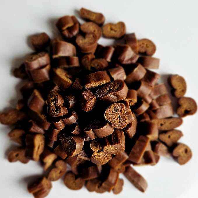 Buffalo Bites (Sausage Bites), small brown sausage treats with a firm, textured surface and varied cut shapes.