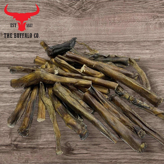 Buffalo Tail - Dog Treats made from natural dark brown buffalo tails with a tough, ridged texture