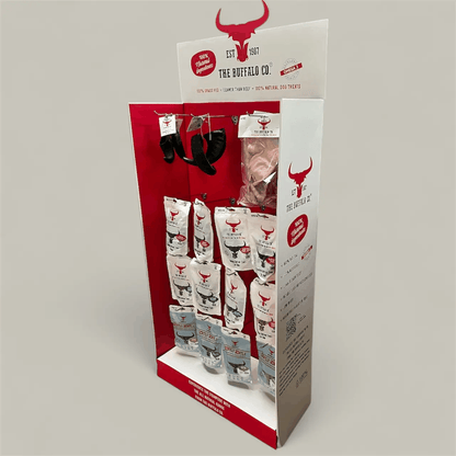 Buffalo Trade Stand Deal- with product featuring a red and white cardboard display stocked with buffalo treat bags and chews