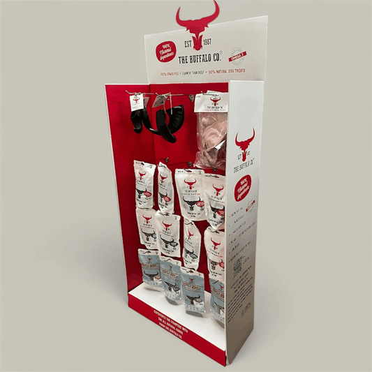 Buffalo Trade Stand Deal- with product featuring a red and white cardboard display stocked with buffalo treat bags and chews