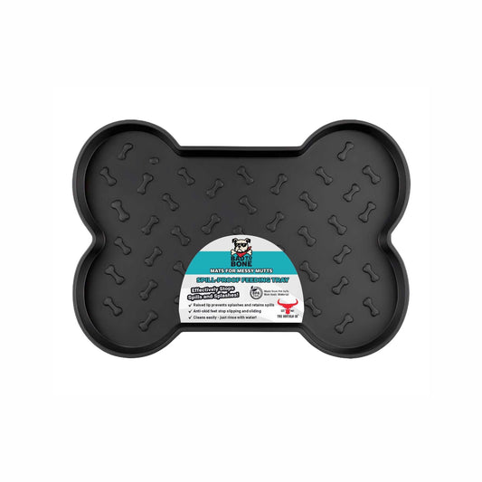 Spill-Proof Dog Feeding Mat in black with a raised bone-shaped rim and embossed bone pattern across its surface.