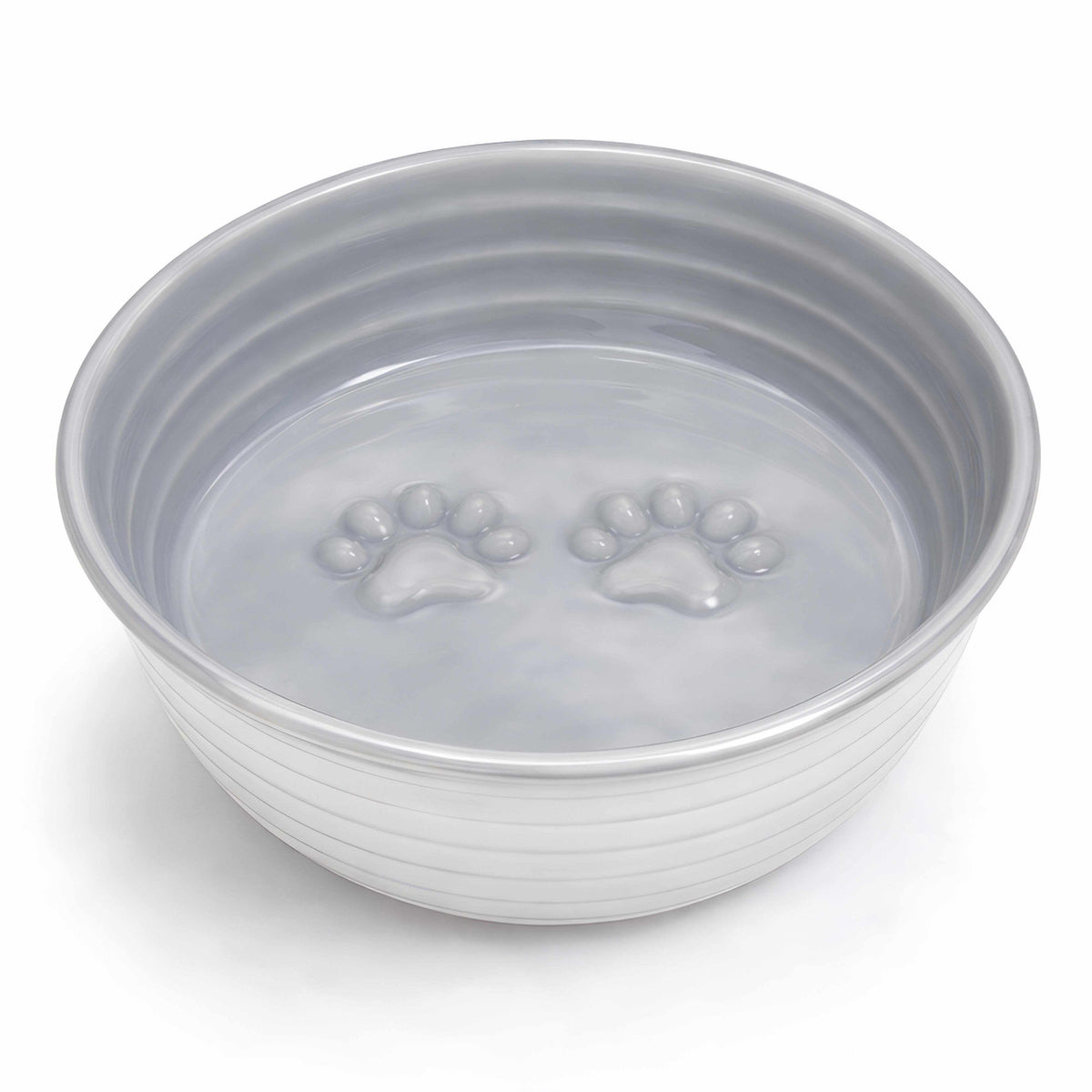 Dog bowl from The Poppy Collection in pale grey with a smooth finish, raised paw-print details and ribbed sides