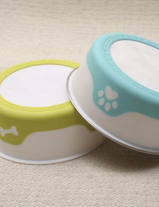 Insulated dog bowl with hinged lids and green outer base, paw icon detail
